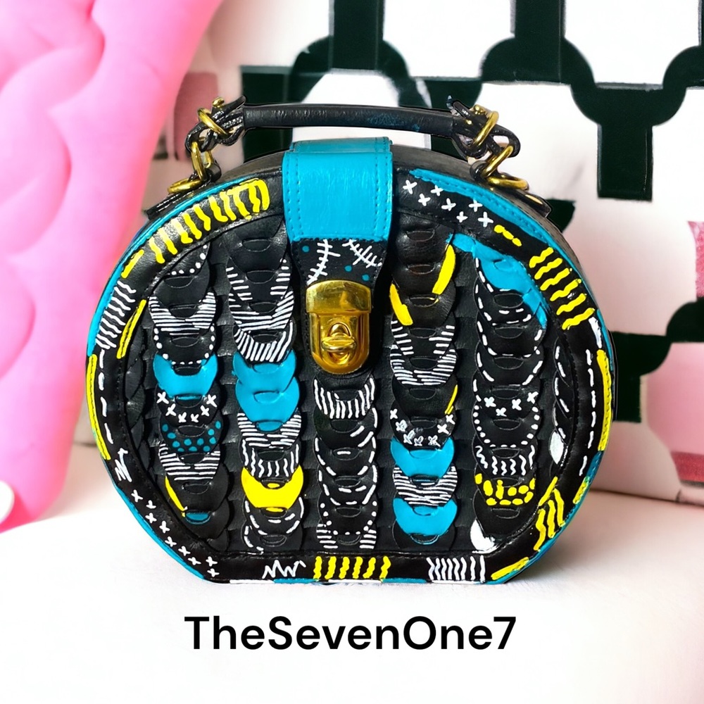 Vintage upcycled round shaped leather handbag.